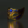 Ornate Golden Mask With Blue Gemstone Intricate Decorative Patterns And Classic Design