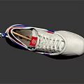 White Sneakers With Red And Blue Accents On Tongue Laces And Soles