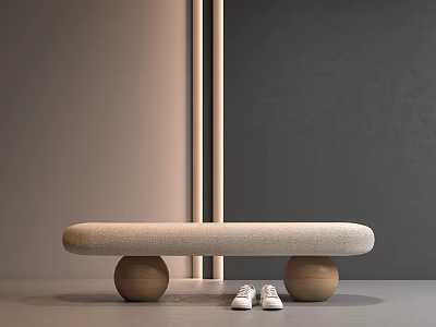 Light Gray Padded Bench with Two Round Wooden Legs and White Shoes Near Gray Wall 3d model