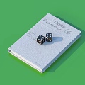 Gray Daily Planning Notebook With Black Dice On Green Background