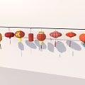 Traditional Household Lanterns in Multiple Colors and Designs Hanging on String Over White Wall