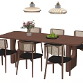Modern Wooden Tea Table And Rattan Chairs With Dark Cushions Decorative Vase And Hanging Lights