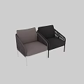 Sleek Black Wicker Leisure Chair With Metal Frame And Comfortable Cushioned Seat