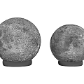 Two Round Table Lamps With Lunar Surface Texture And Modern Black Bases 3d model