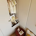 Modern Wardrobe Interior Design With Light Green Drawers Hanging Clothes And Storage Shelves