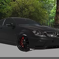 Black Mercedes Benz Sports Car With Red Rims And Sporty Front Face Design