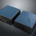 Two Blue Square Storage Boxes as Practical Household Items with Cross Straps Design