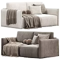 Modern Two Seater Sofa With Draped Blanket Round Pillows And Plaid Cushions For Living Room