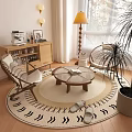 Round Glass Top Coffee Table With Wooden Legs And Wicker Chairs In Bright Living Room