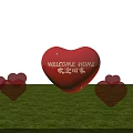 Roadside Welcome Heart Sculpture With Green Grass And Blue Sky Background