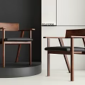 Modern Wooden Dining Chair with Black Cushion and Minimalist Design Displayed in Contemporary Interior Setting