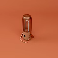 Copper Colored Microphone With Mesh Top On Orange Background And Stand