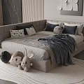 Modern Double Bed With Beige Frame Multiple Pillows Gray Blanket Stuffed Toys And Rug