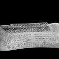 Modern White Lounge Chair With Mesh Structure And Curved Design Details