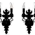 Two Black Classical Wall Sconces With Candle Shaped Lights And Floral Carved Design