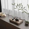 Natural Window Sill Teaset On Wooden Tray With Open Book And Green Plant