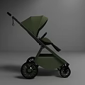 Green Modern Baby Stroller With Sleek Frame And Large Wheels Design