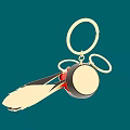 Gold Keychain Pendant With Red Circular Element And Black Peacock Feather Design