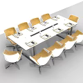 Modern Conference Table Design With White And Wooden Chairs And Tabletop Decorative Bottles