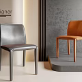 Designer Modern Dining Chairs With Gray And Brown Leather Seats On Display Platform