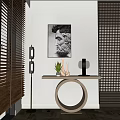 Entryway Console Table With Circular Base Portrait Painting Small Plant Lamp And Wooden Blinds