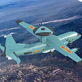 Light Blue Fighter Jet With Propellers And Top Radar Dome Flying Over City