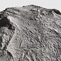 Rugged Natural Mountain Terrain With Visible Rock Textures And Undulating Surface Features