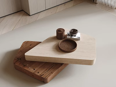 Light Wood Coffee Table With Dark Wood Base Featuring Decorative Plate And Small Tray 3d model