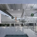 Modern Sales Office Building With Glass Curtain Wall And Pool Water Reflection Greenery
