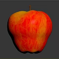 Fresh Red and Yellow Apple With Shiny Surface on Gray Background