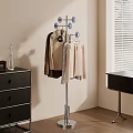 Modern Metal Coat Rack With Hanging Clothes And Multiple Hooks In Bedroom Interior