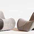 Two Modern Light Gray Lounge Chairs With Curved Textured Fabric Design