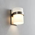 Modern Wall Lamp With White Glass Shade And Silver Metal Ring On Gray Wall