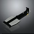 Handheld Black And White Tool With Multiple Metal Prongs And Ergonomic Handle Design
