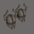 Two Horned Medieval Helmets With Golden And Silver Metal Decorative Design