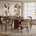 Round Wooden Dining Table Set With Six Beige Cushioned Chairs On Rug And Pendant Light