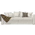 White Three Seater Sofa With Checkered Blanket And Decorative Pillows 3d model