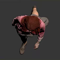 Red Haired Woman Wearing Pink Top And Gray Skirt Walking Against Gray Background