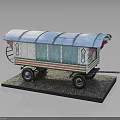 Vintage Model Caravan With Blue Roof Green Pink Stripes And Decorative Patterns On Gravel Base
