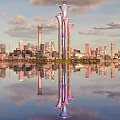 Illuminated Landscape Sculpture With Three Towers Olympic Rings And City Water Reflection