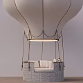 White Hot Air Balloon Shaped Pendant Light With Woven Base And Seating Area