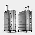 Sleek Modern Silver Hard Shell Suitcases With Telescopic Handles And Rolling Wheels