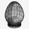 Egg Shaped Rattan Leisure Chair With Woven Design Round Base And Gray Cushion