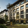 Modern Multistory Residential Exterior With Green Landscape And Leisure Seating Area