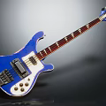 Vibrant Blue Electric Bass Guitar With Vintage Design Maple Neck And Metal Hardware