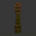 Decorative Column With Green Brown Textured Surface And Ornamental Carved Details