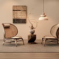 Natural Wicker Leisure Chairs In Indoor Space With Pendant Lamp And Decorative Vase