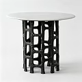 Round White Modern Dining Table With Black Geometric Hollow Carved Legs