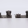 Modern Kitchen Appliances Featuring Stove Kettle Pots And Frying Pan Setup