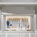 Chic Fashion Window Display With Mannequin Wavy Textured Backdrop Vase And Illuminated Shelves